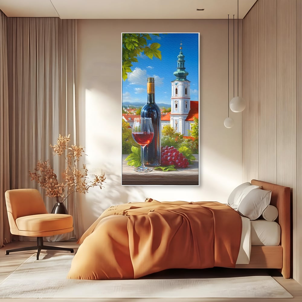 Tablou canvas cu pictura cu sticla de vin si manastire, in rama de aluminiu argintiu, pe perete intr-un dormitor